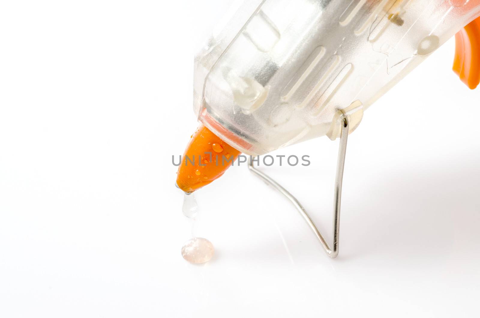 Hot glue gun isolated on white.close up by 9george