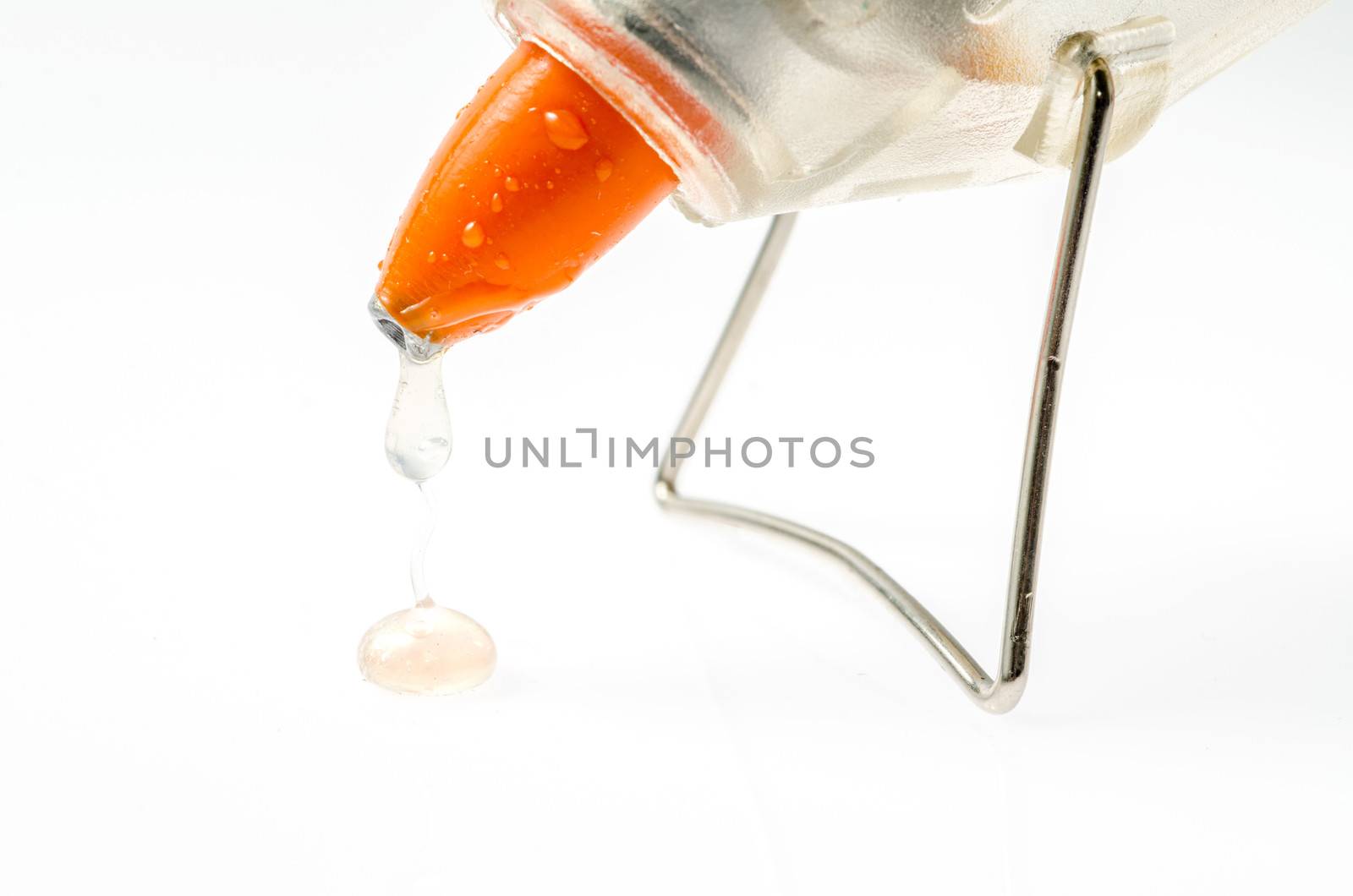 Hot glue gun isolated on white.close up by 9george