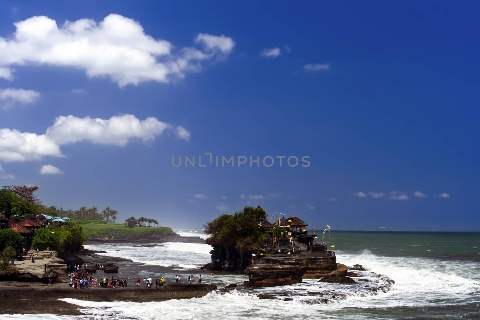 Tanah Lot and Clouds, Bali. Indonesia. Ocean beach.