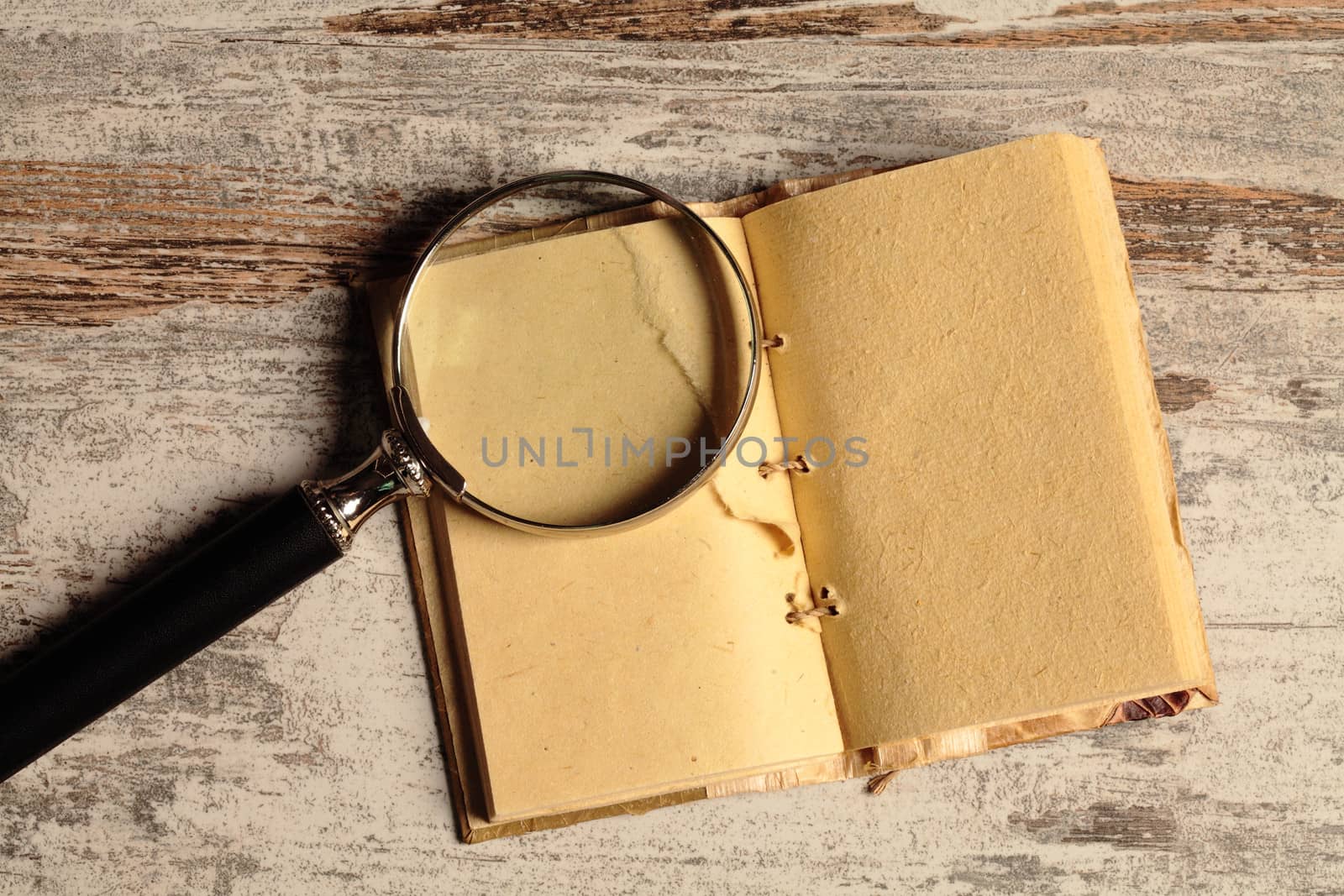 notebook and magnifying glass by erllre