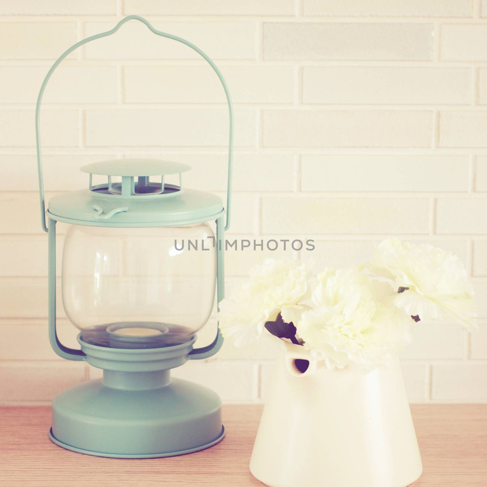 Vintage lamp and flower with retro filter effect