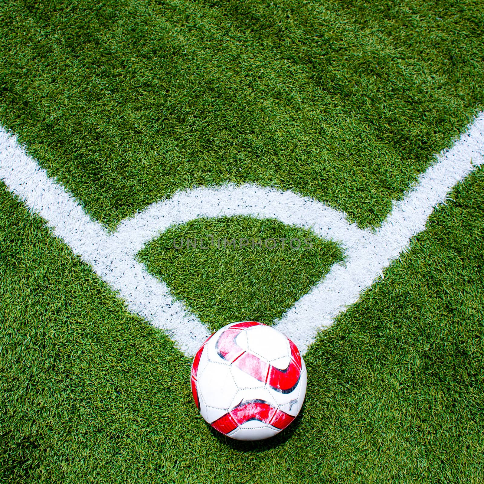 Soccer ball on the field corner