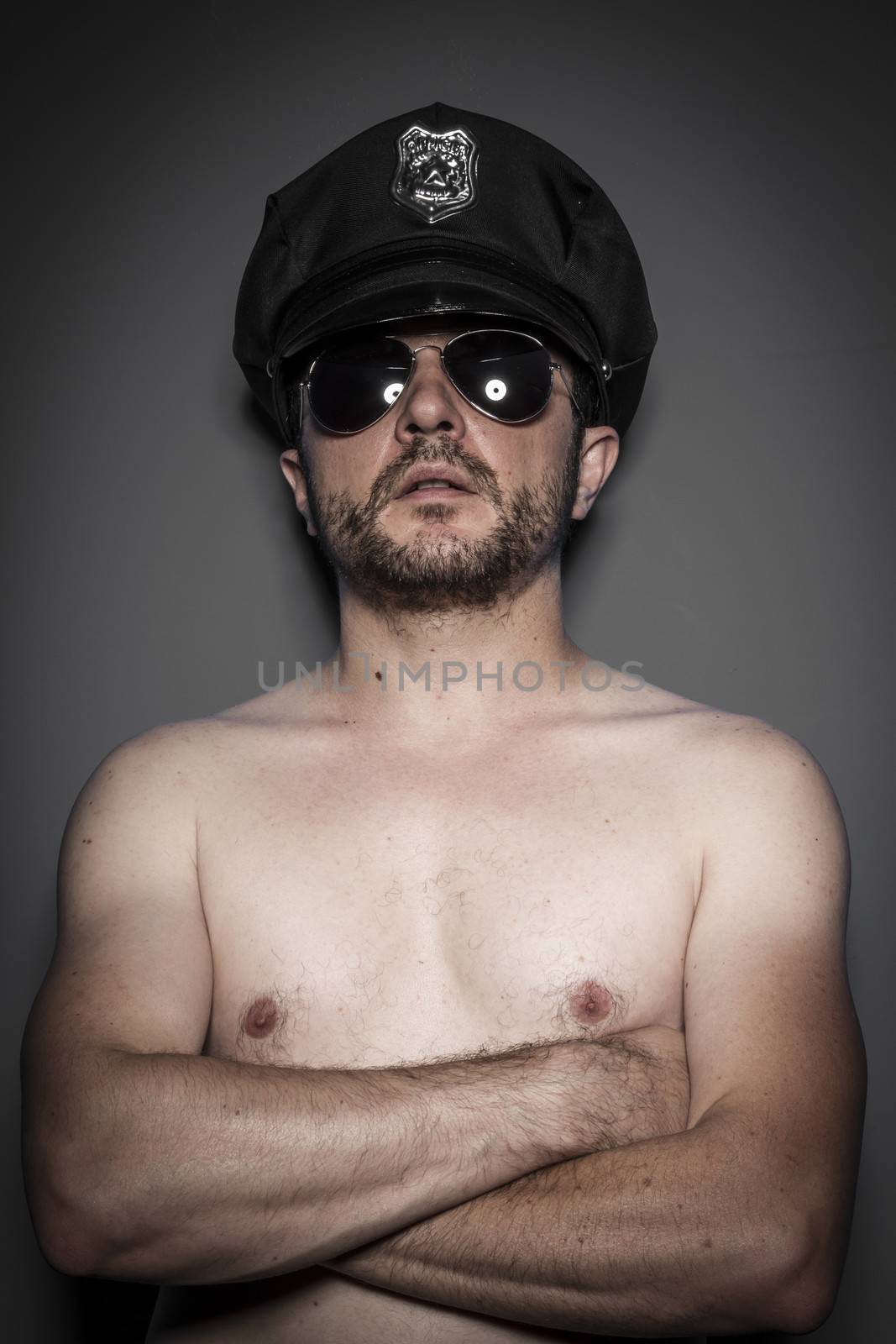 Sensual, Good looking policeman, sexy police with sunglasses ove by FernandoCortes