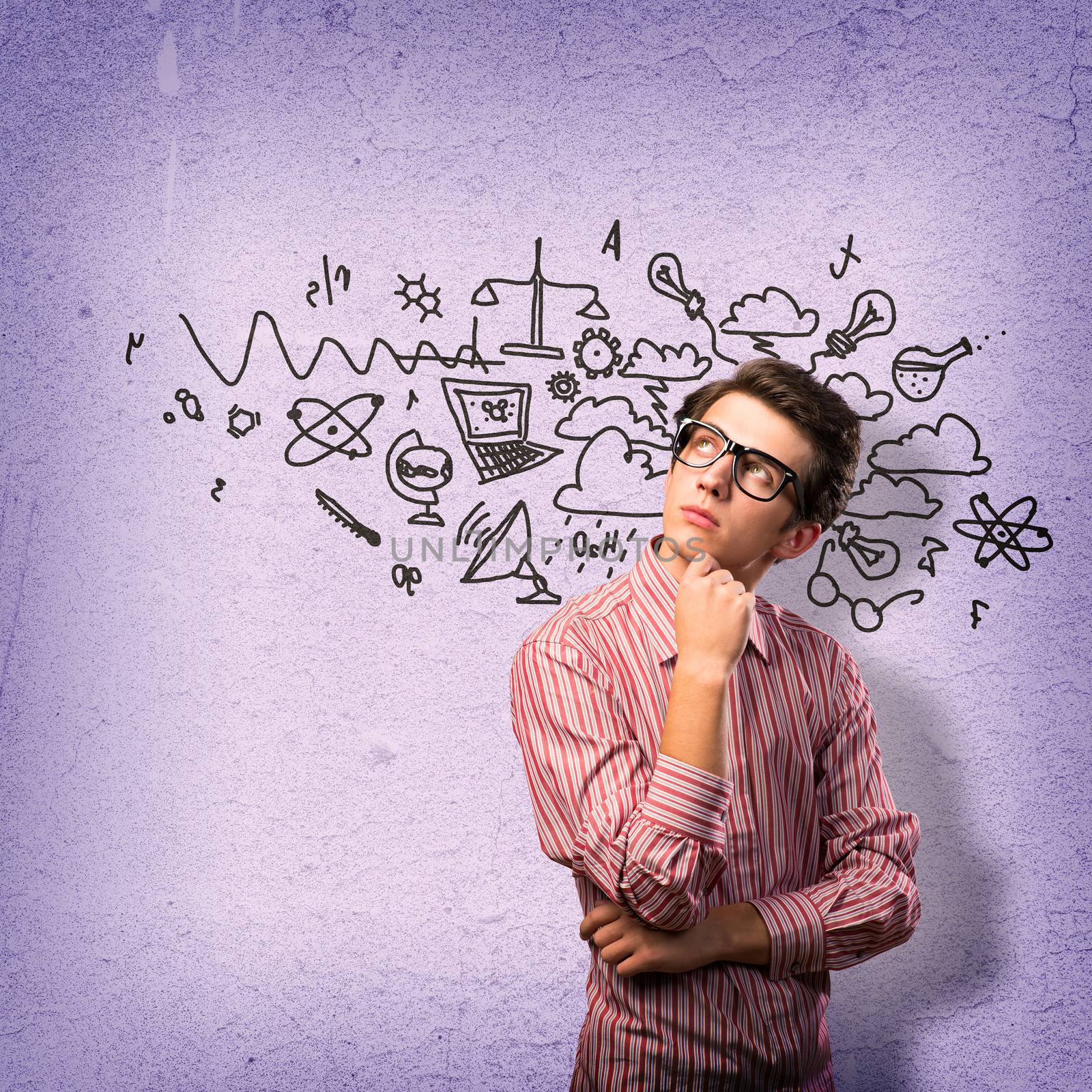 young man scientist in glasses thinking. next to it various painted symbols