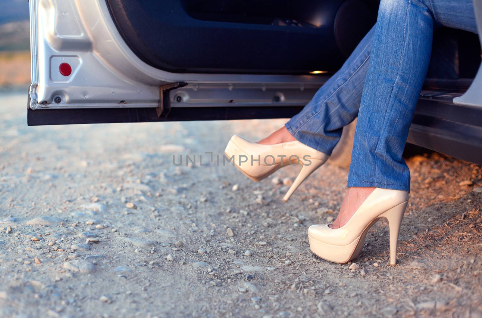 Young lady get out of the car