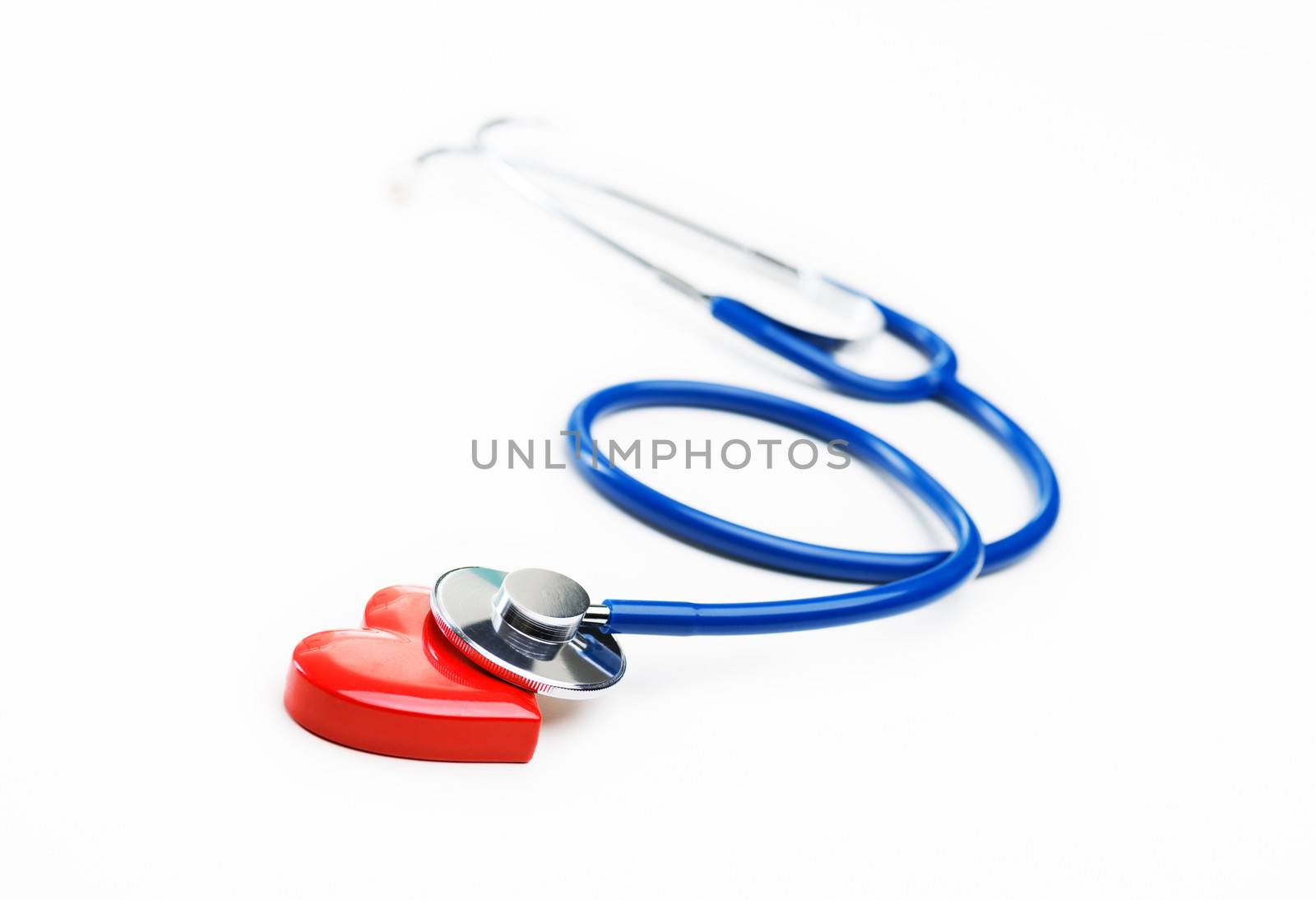 Blue stethoscope and heart shape, cardiovascular diseases and prevention concept.