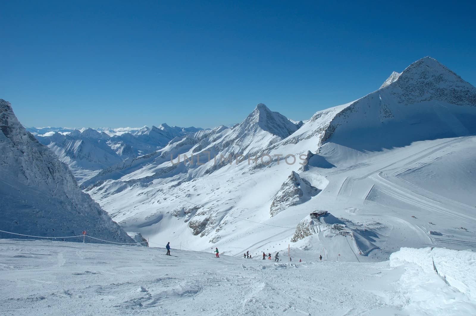 Ski slopes on Hintertux glacier in Alps nearby Zillertal valley in Austria