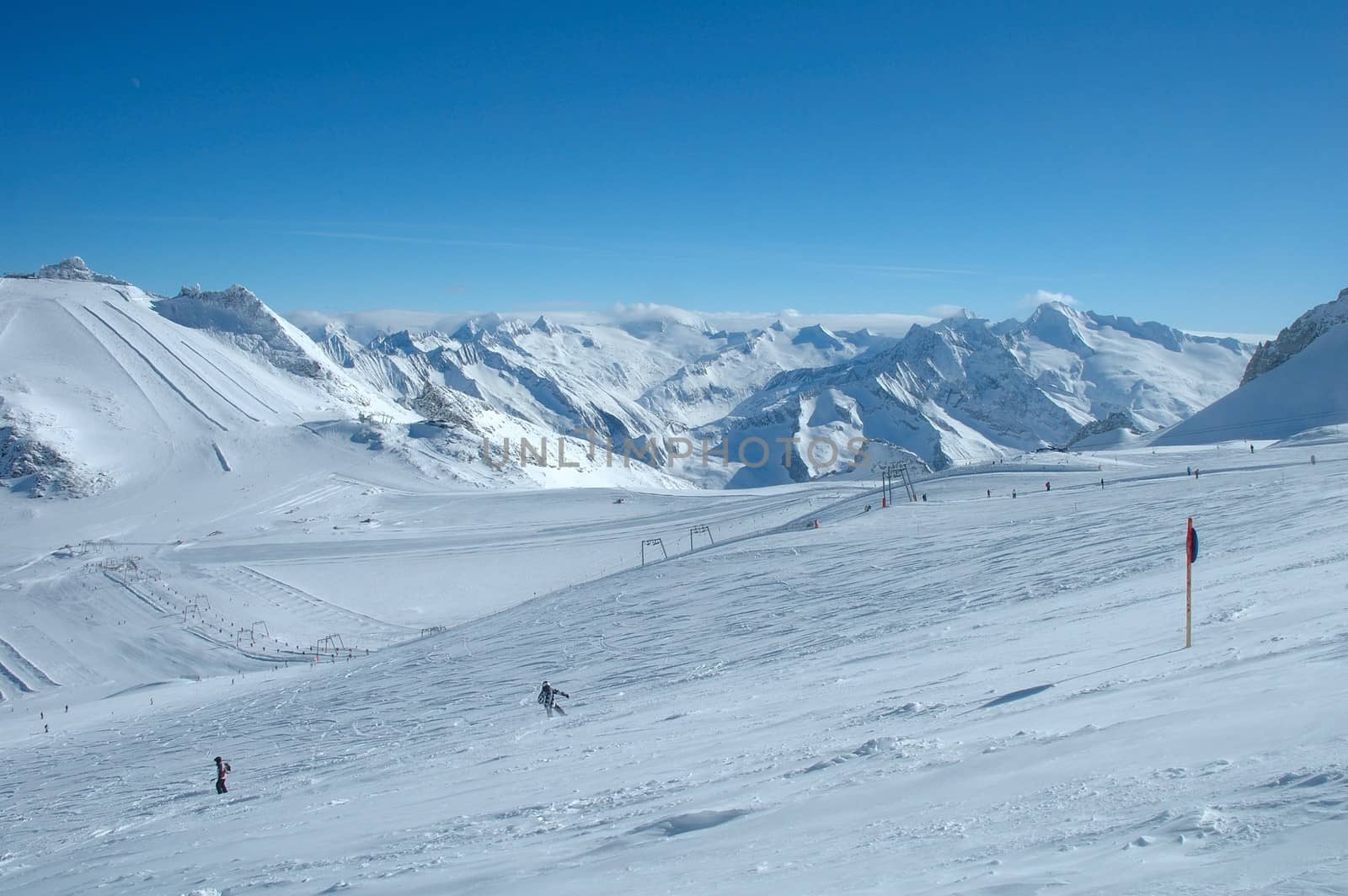 Ski slopes on Hintertux glacier in Alps nearby Zillertal valley in Austria