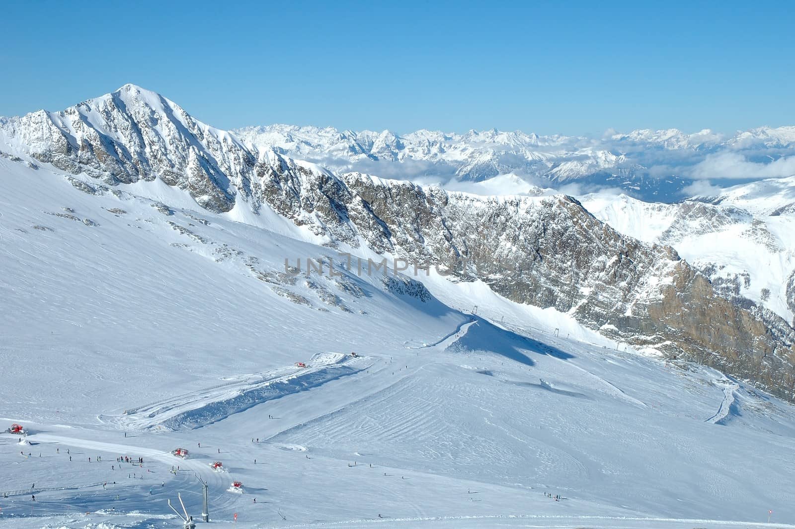 Ski slopes on Hintertux glacier in Alps nearby Zillertal valley in Austria