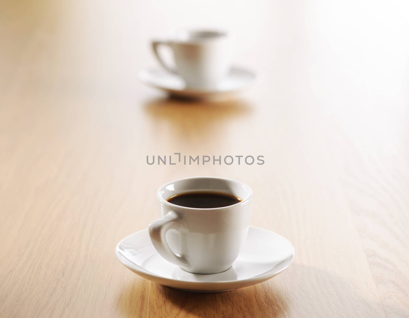 Two cup of coffee on wooden table, copy space