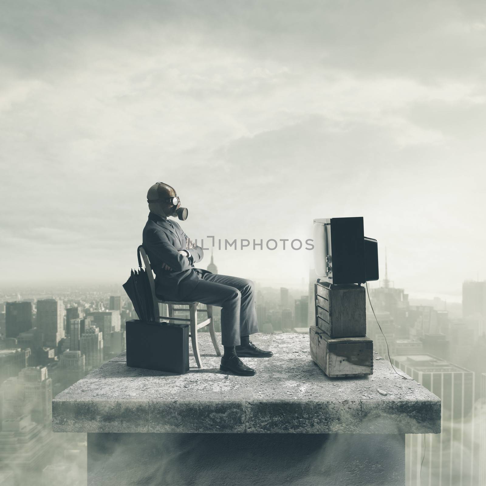 Businessman wearing a gas mask watching TV