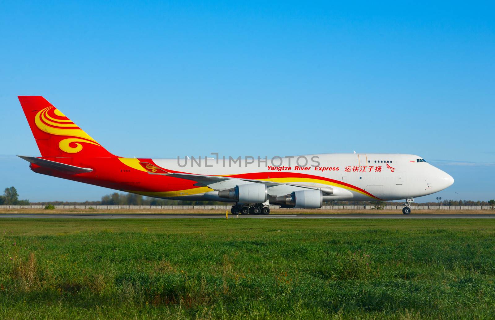 NOVOSIBIRSK, RUSSIA - SEPTEMBER 13, 2013: Yangtze River Express Boeing 747 airfreighter before take-off. Spotting at airport Tolmachevo, Sep.13, 2013, Novosibirsk, Russia.