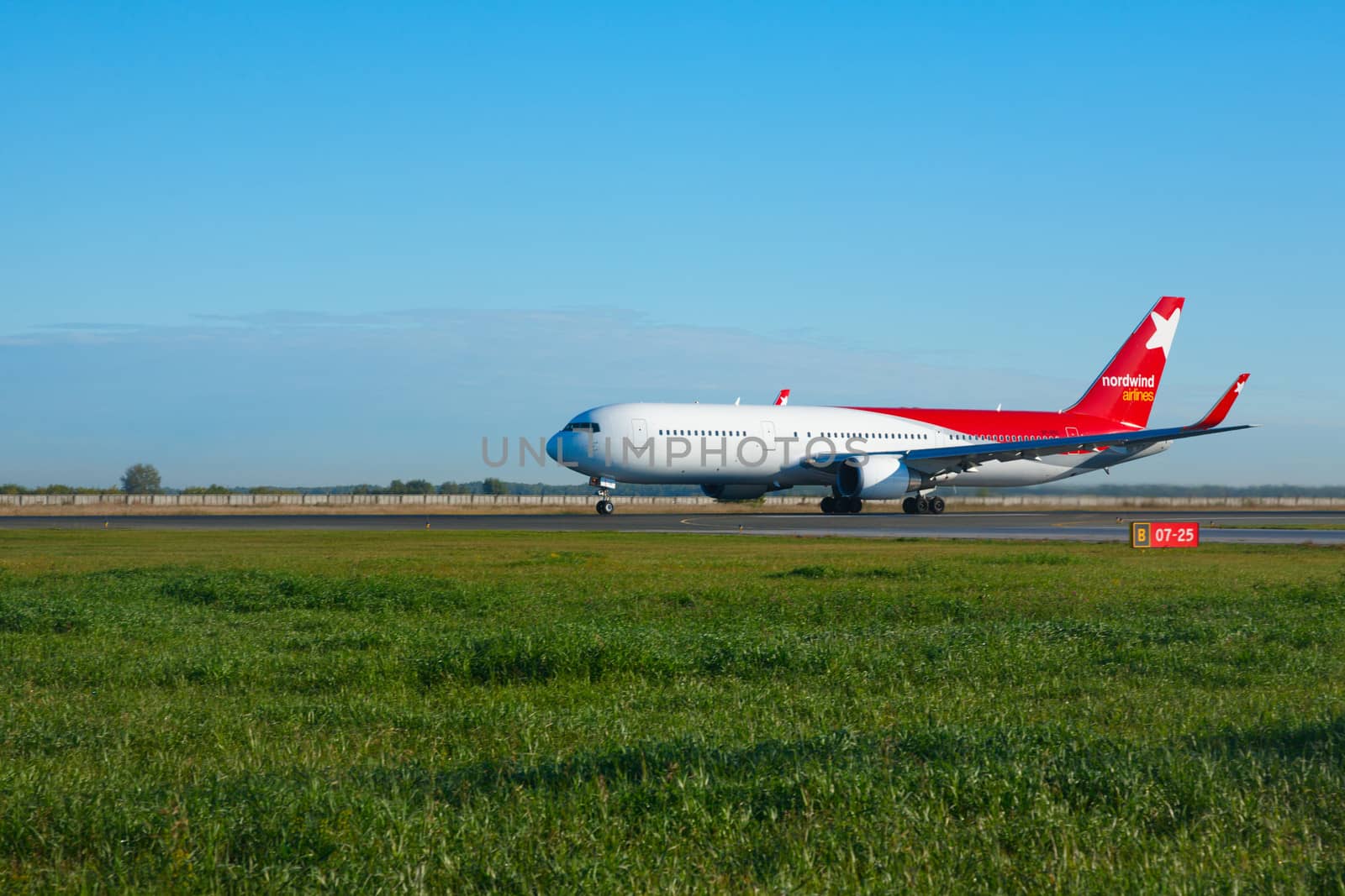 NOVOSIBIRSK, RUSSIA - SEPTEMBER 13, 2013: Nordwind Airlines Boeing 767 before take-off. Spotting at airport Tolmachevo, Sep.13, 2013, Novosibirsk, Russia.