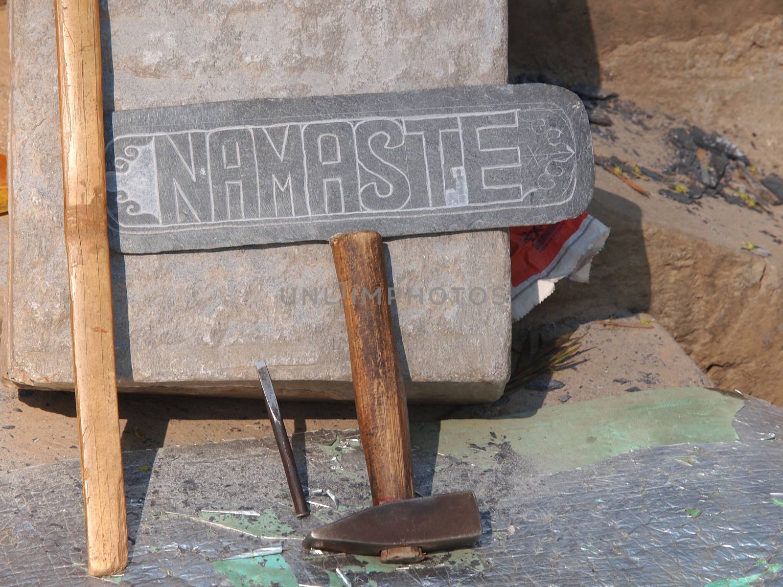 namaste sign made in stone      