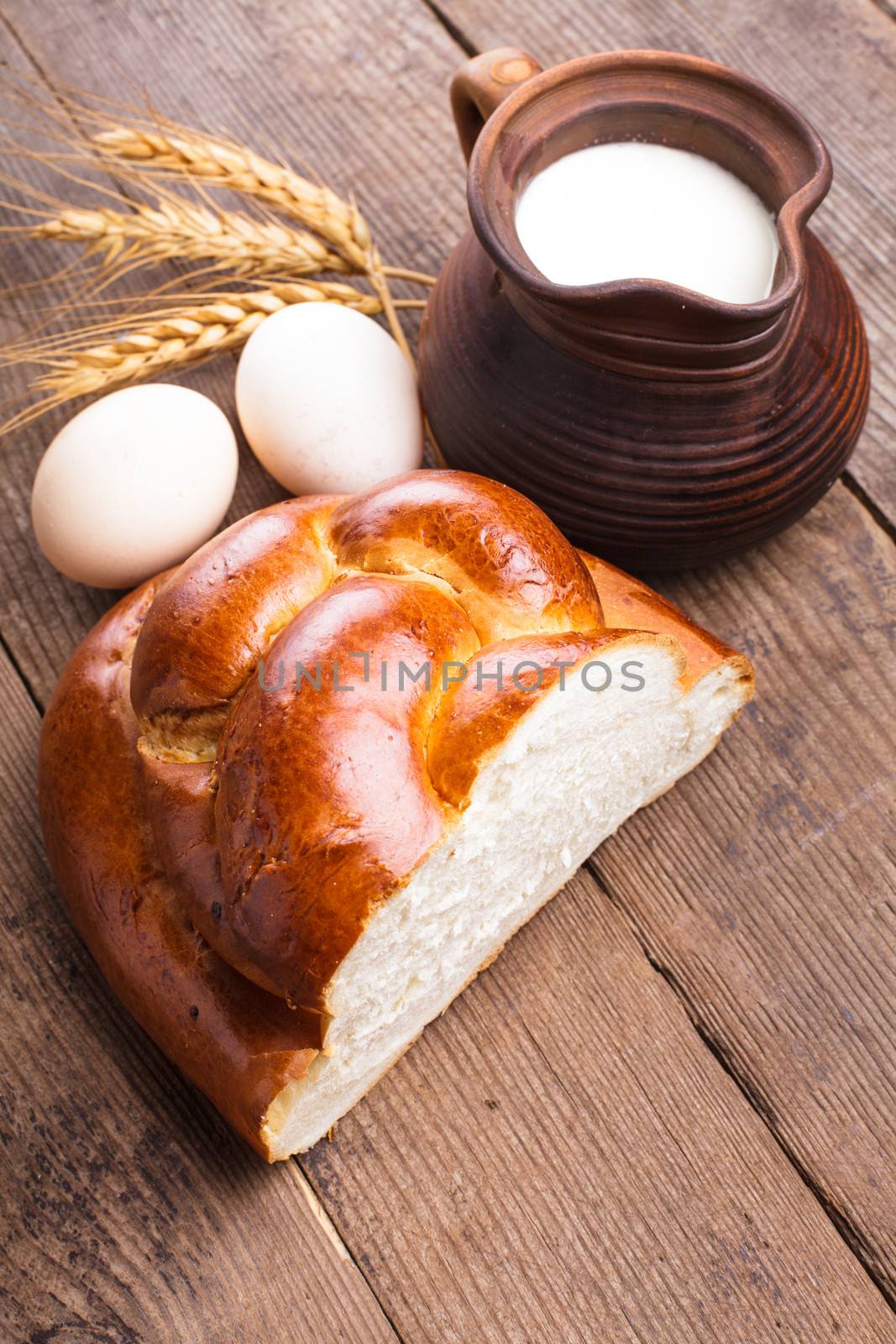 Fresh loaf of challah by oksix