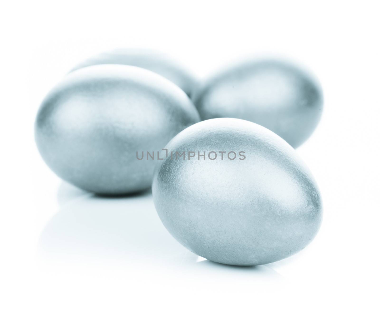 Four silver eggs isolated on white background