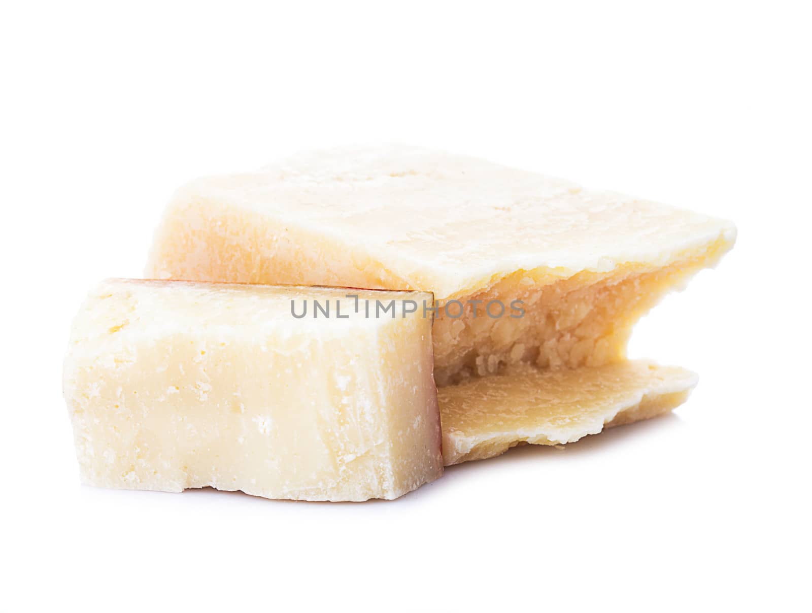 Parmesan cheese part isolated on white background