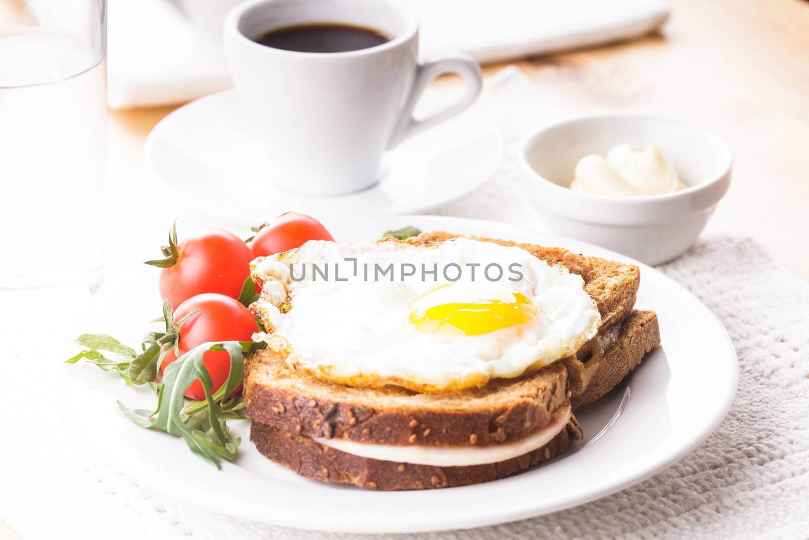 Breakfast with coffee, Croque Madame sandwich close up