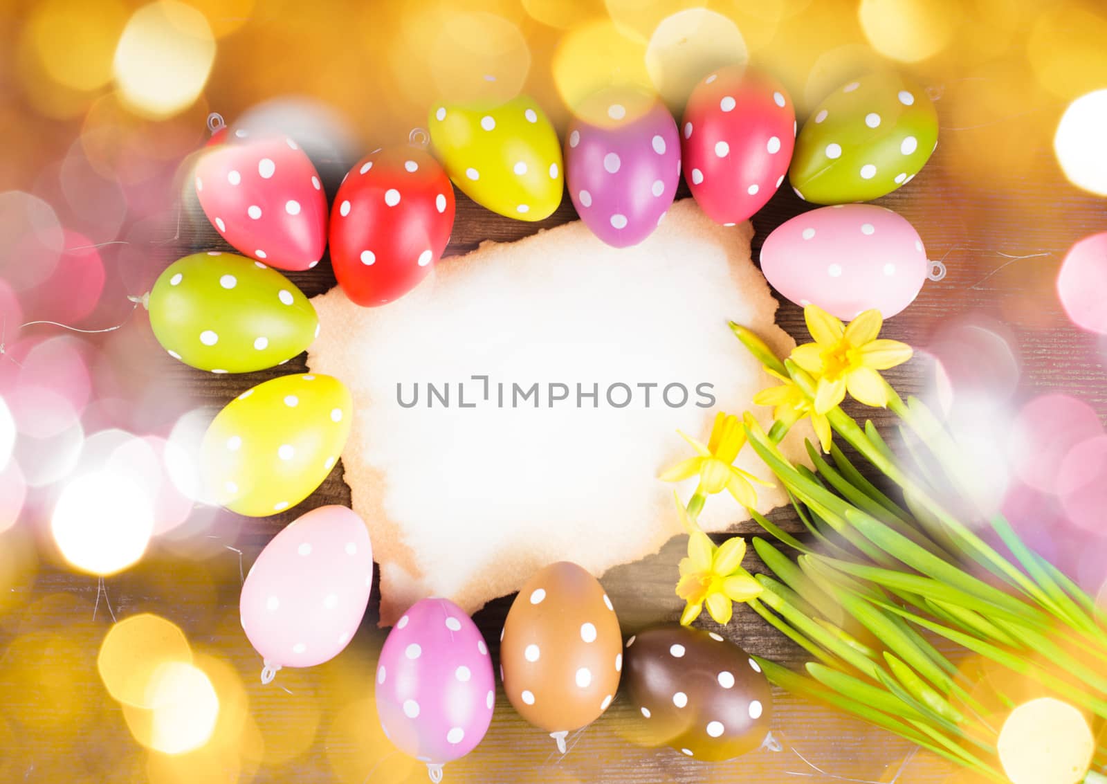 Colorful polka dot eggs and empty greeting card. Easter decorations