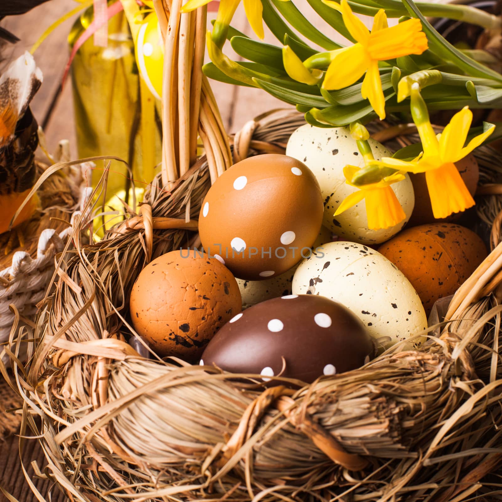 Brown and yellow eggs in basket, Easter decorations