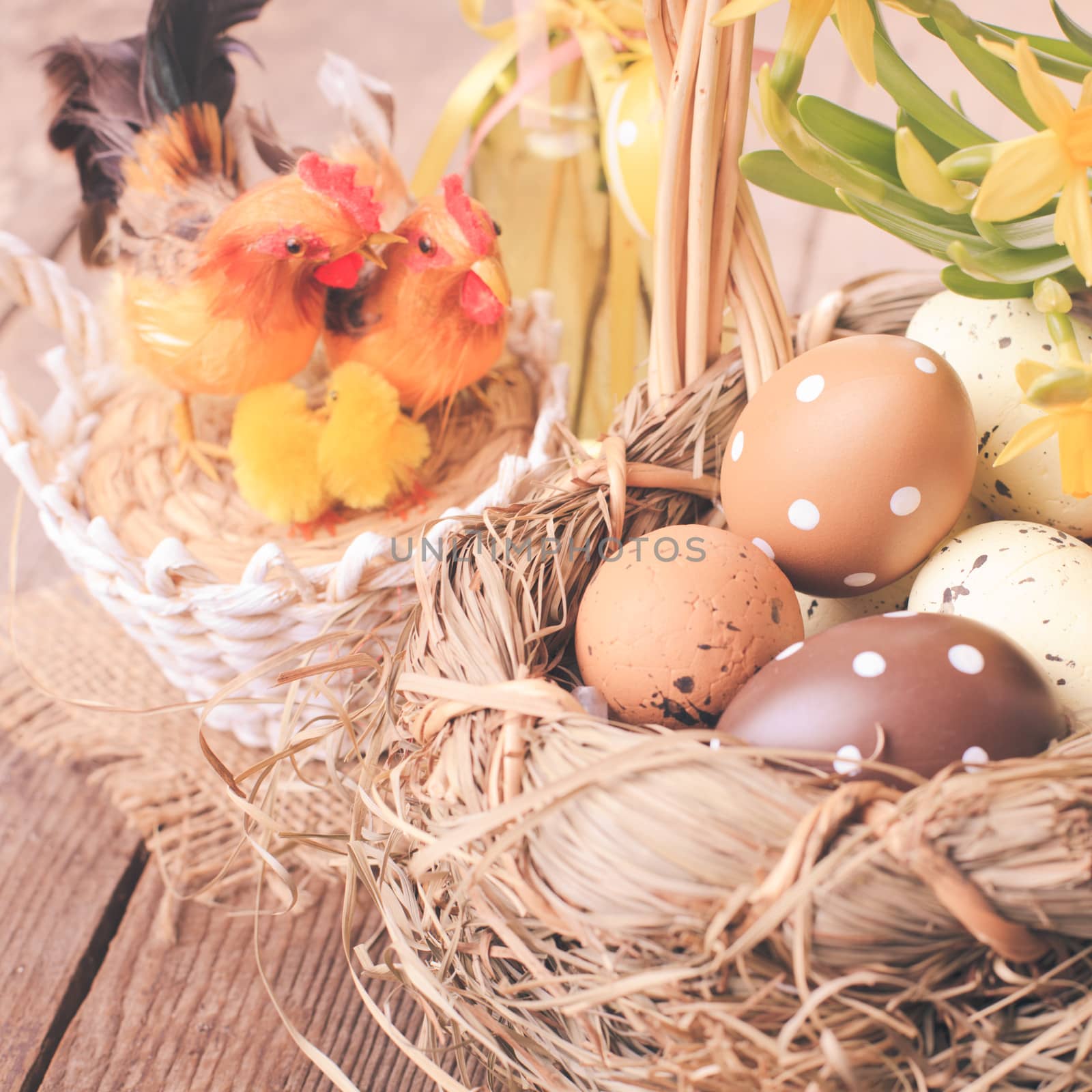 Brown and yellow eggs in basket, Easter decorations