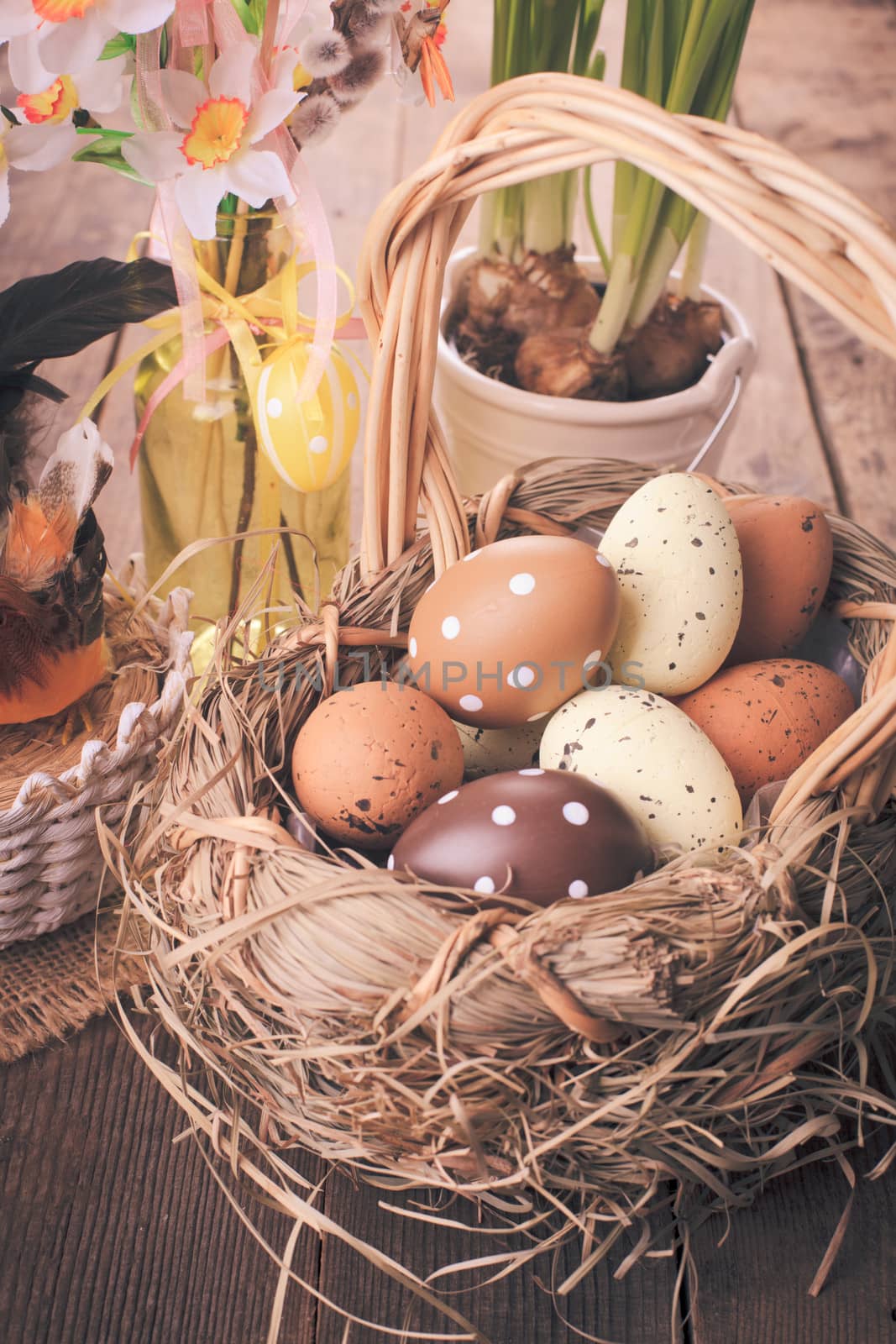 Brown and yellow eggs in basket, Easter decorations