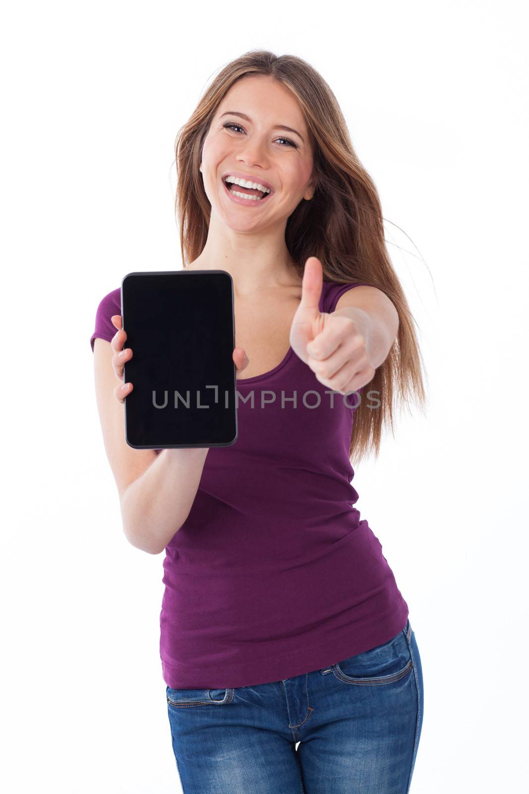 Cheerful woman showing an electronic tablet and having a positive gesture