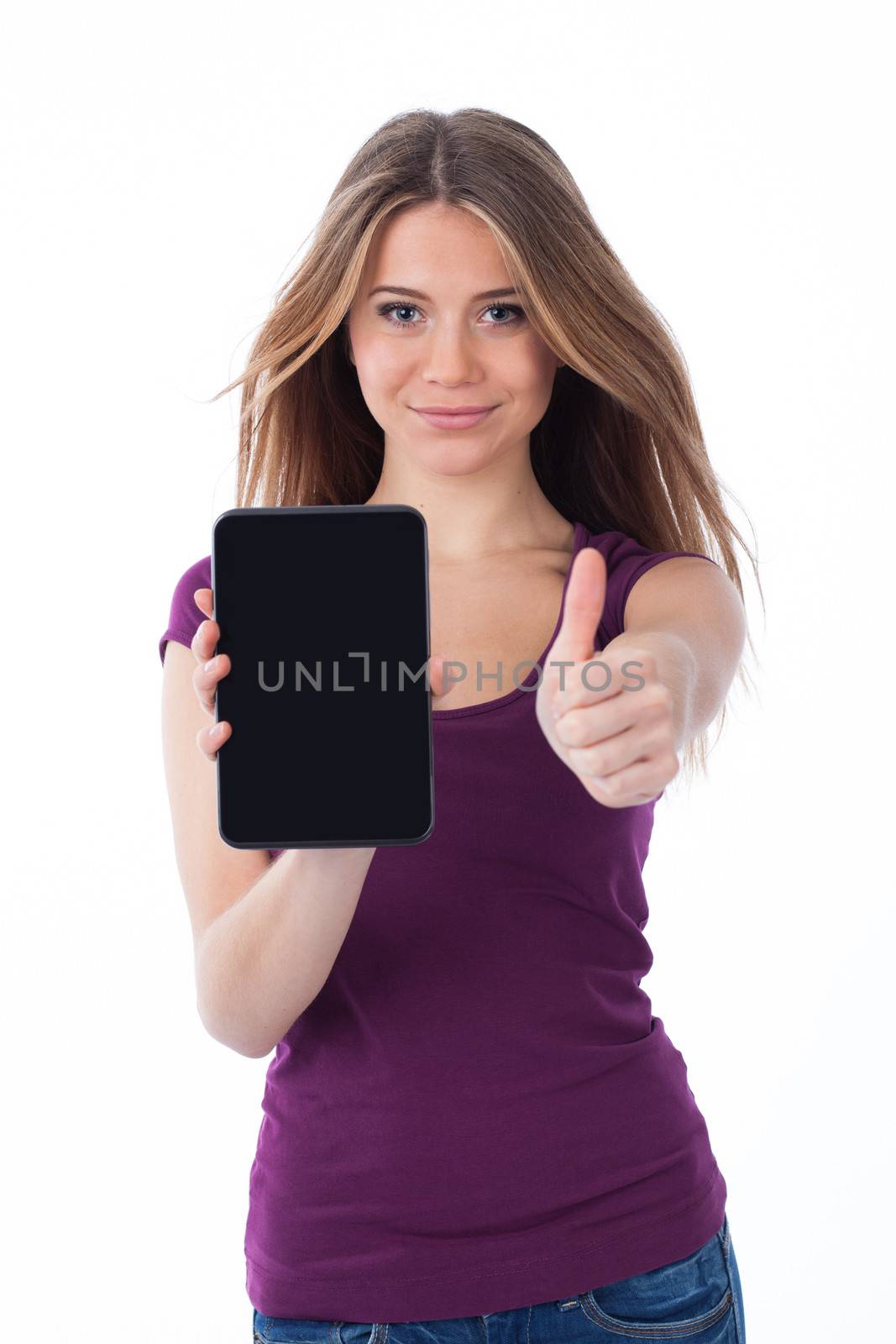 Cute woman showing an electronic tablet and having a positive gesture