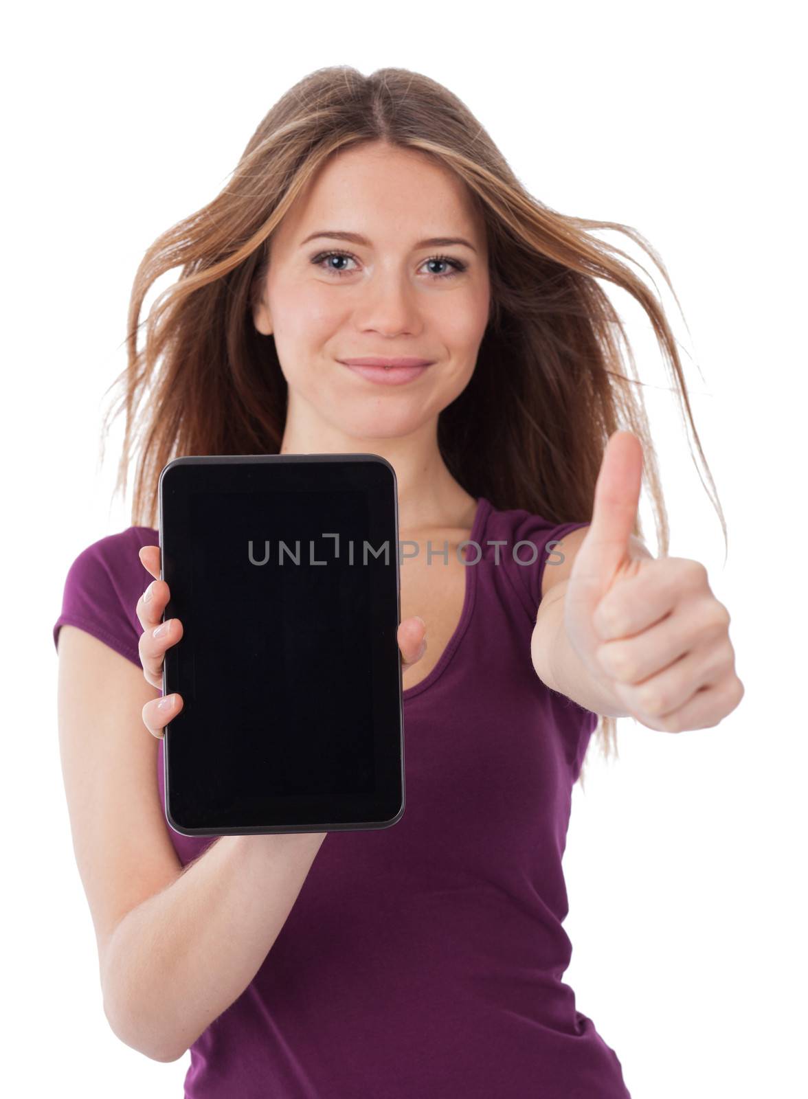 Young woman showing an electronic tablet and having a positive gesture
