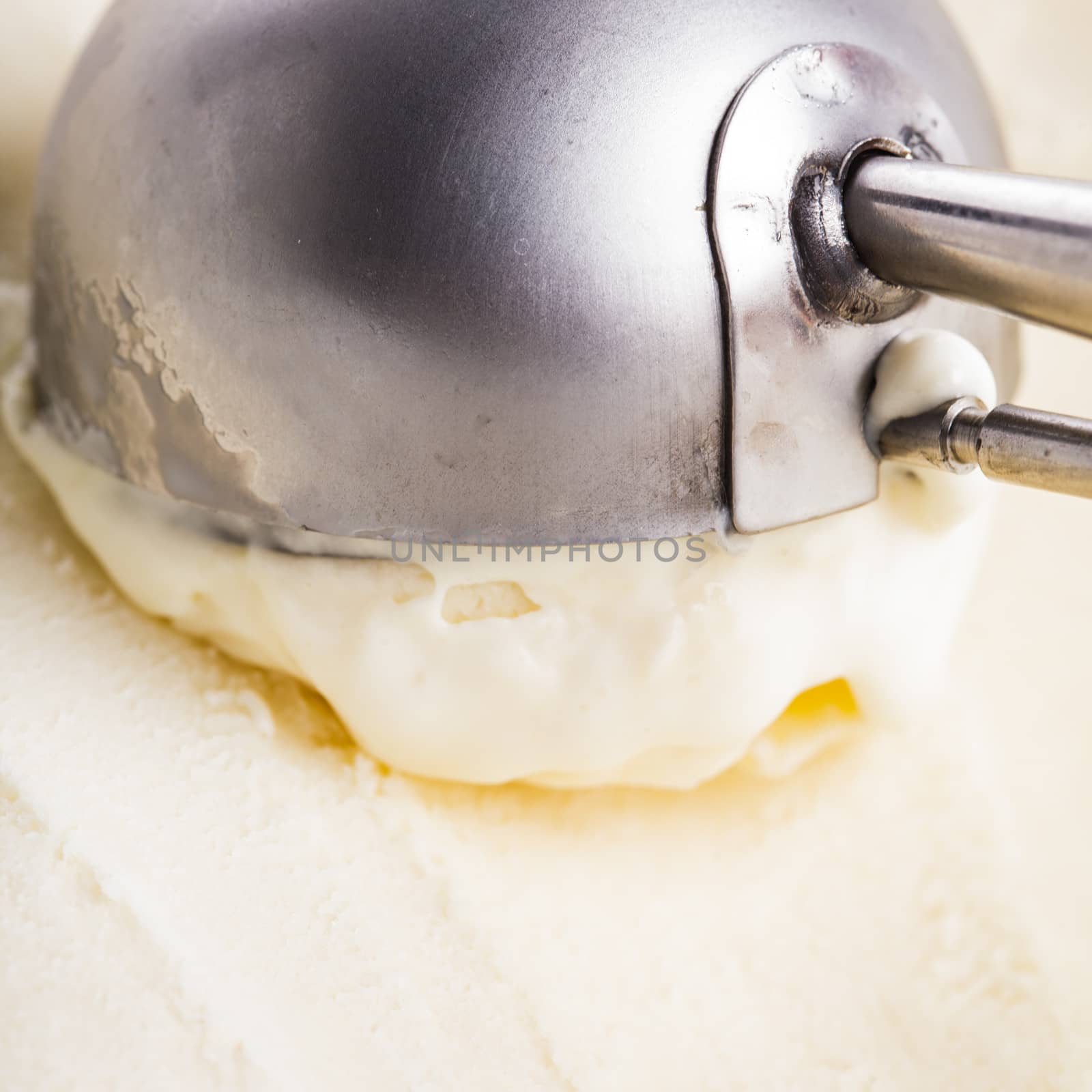 Ball of creamy ice cream in an scoop