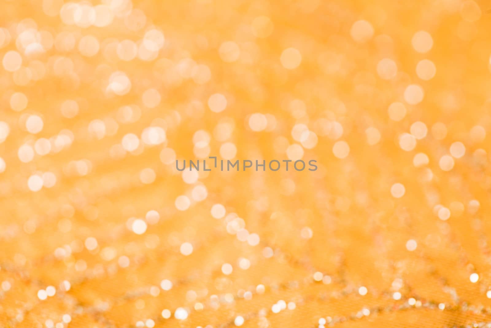 Golden stripes as a bokeh background for design