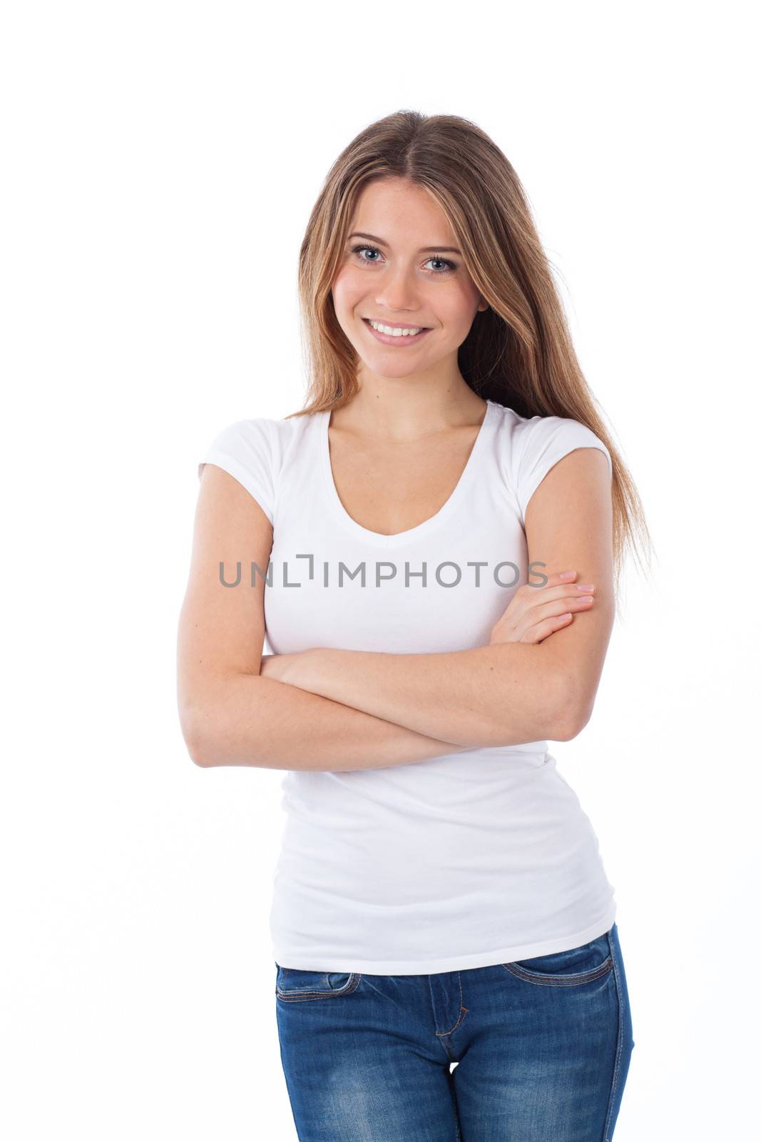 Portrait of a smiling woman looking at the camera with arms crossed, isolated on white