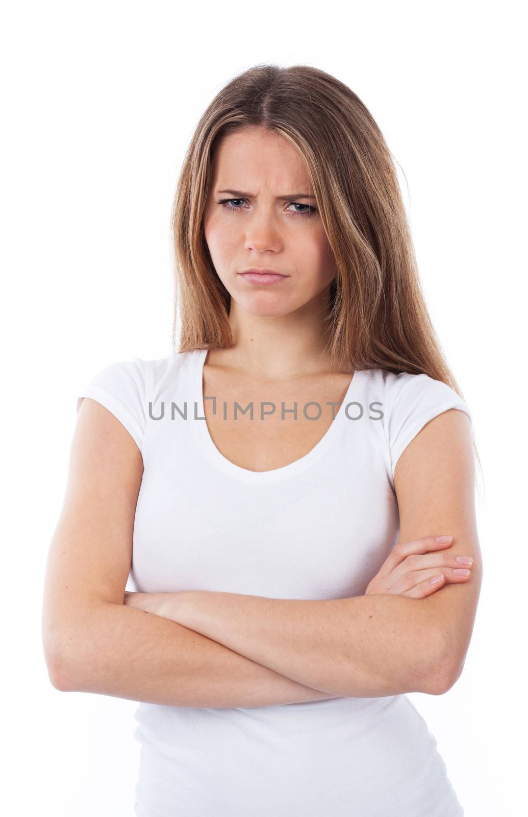 Portrait of an unhappy woman with arms crossed, isolated on white