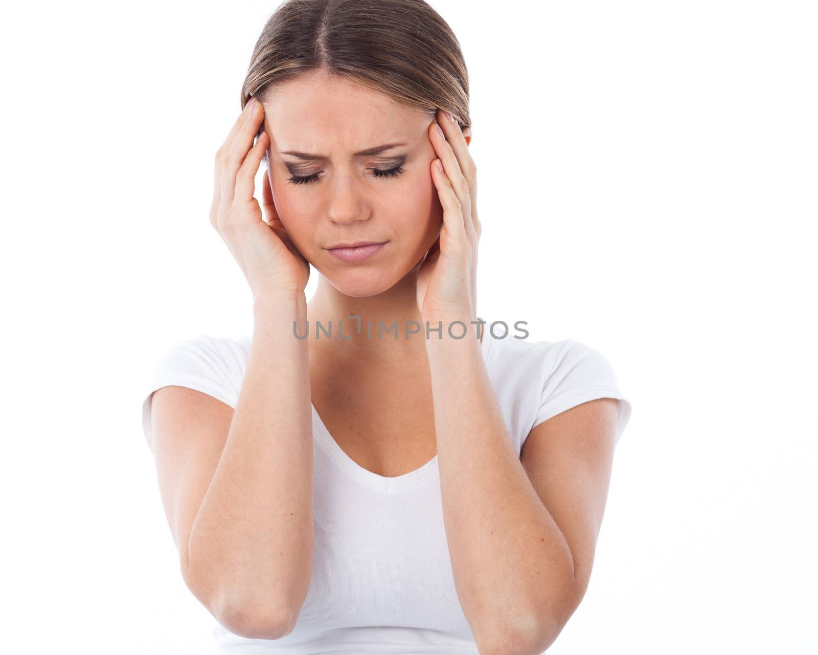 Portrait of young woman suffering from headache, isolated on white