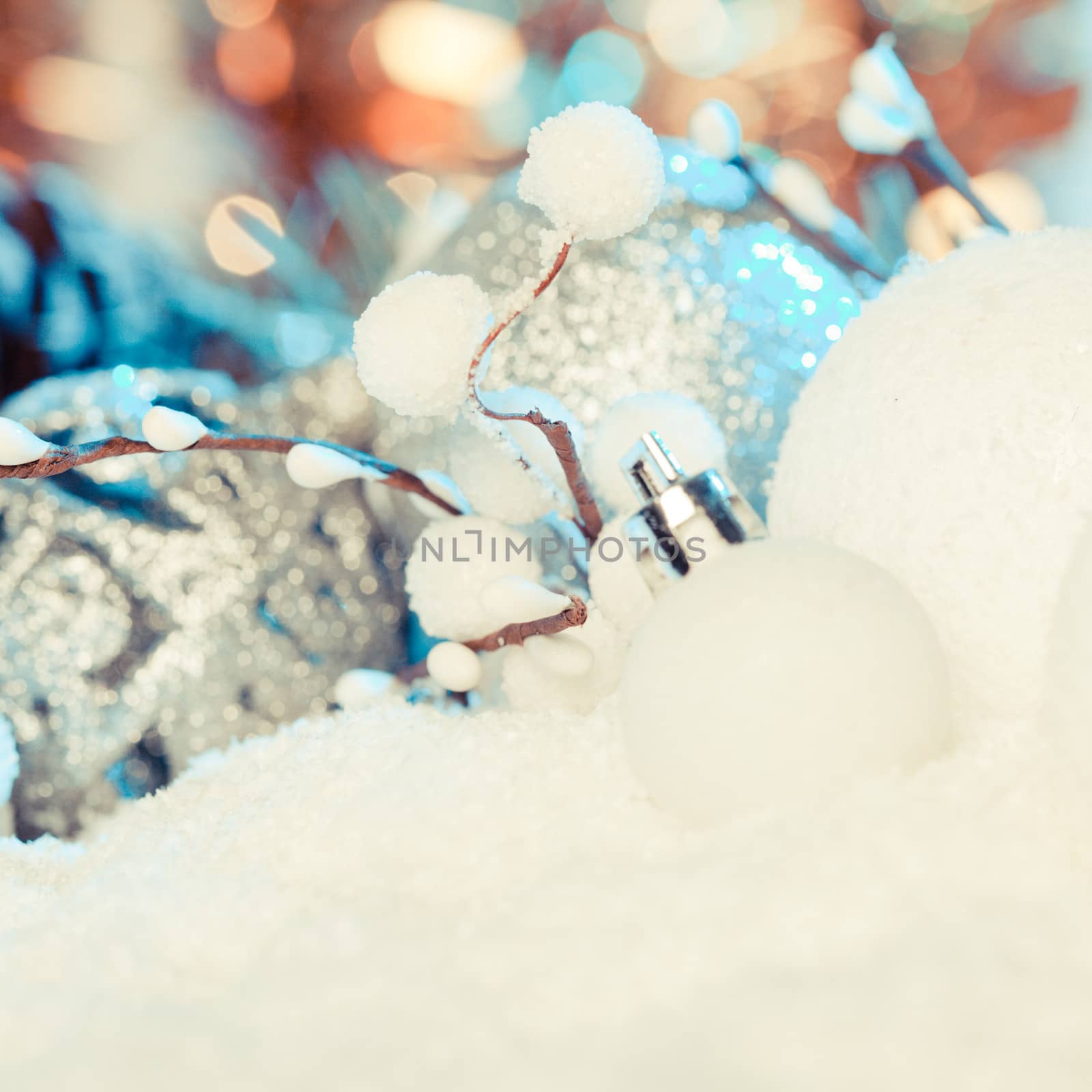 White and silver christmas decor with blue light