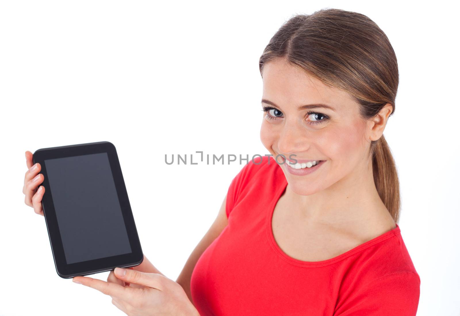 Cheerful girl presenting a blank electronic tablet, communication concept