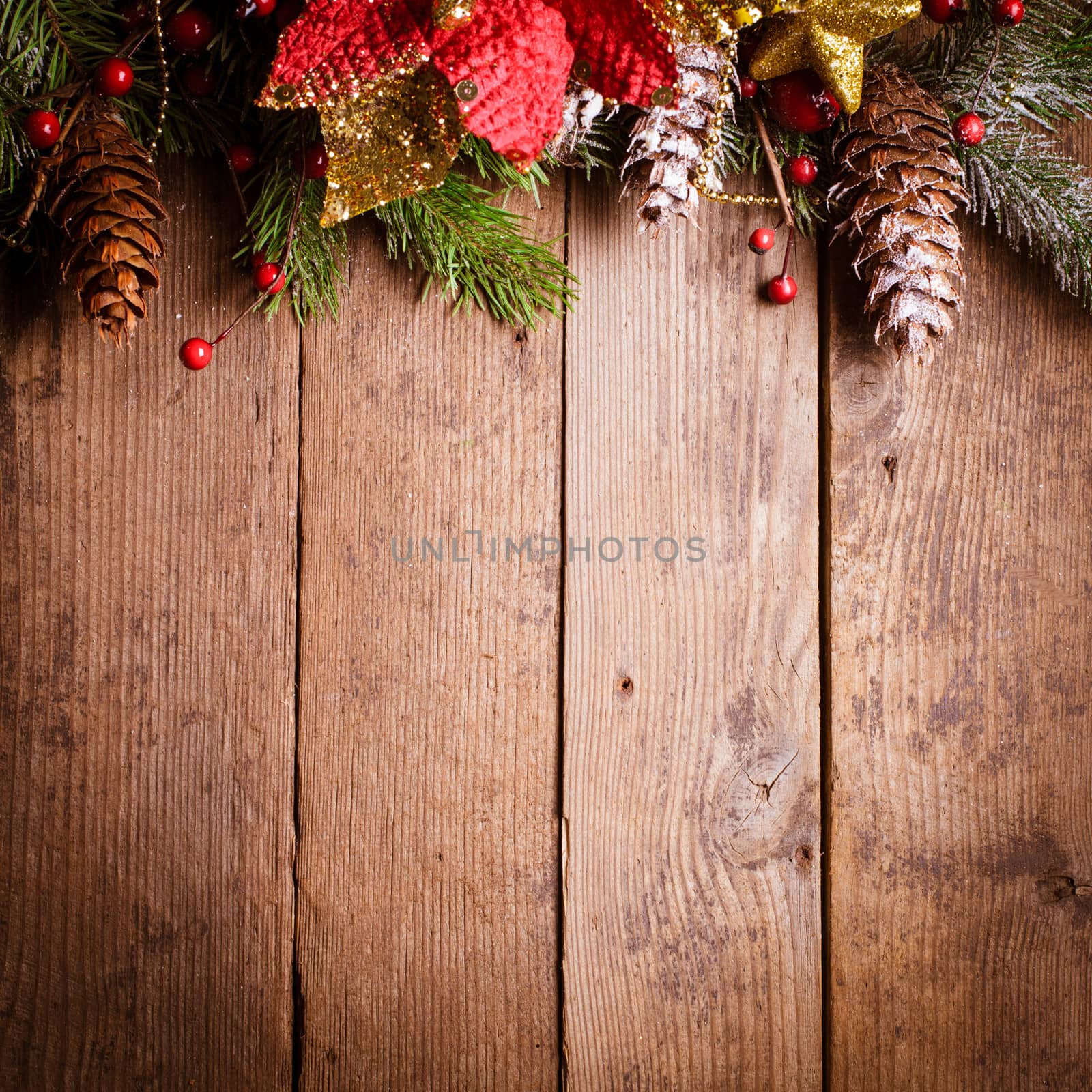 Christmas border design on the wooden background