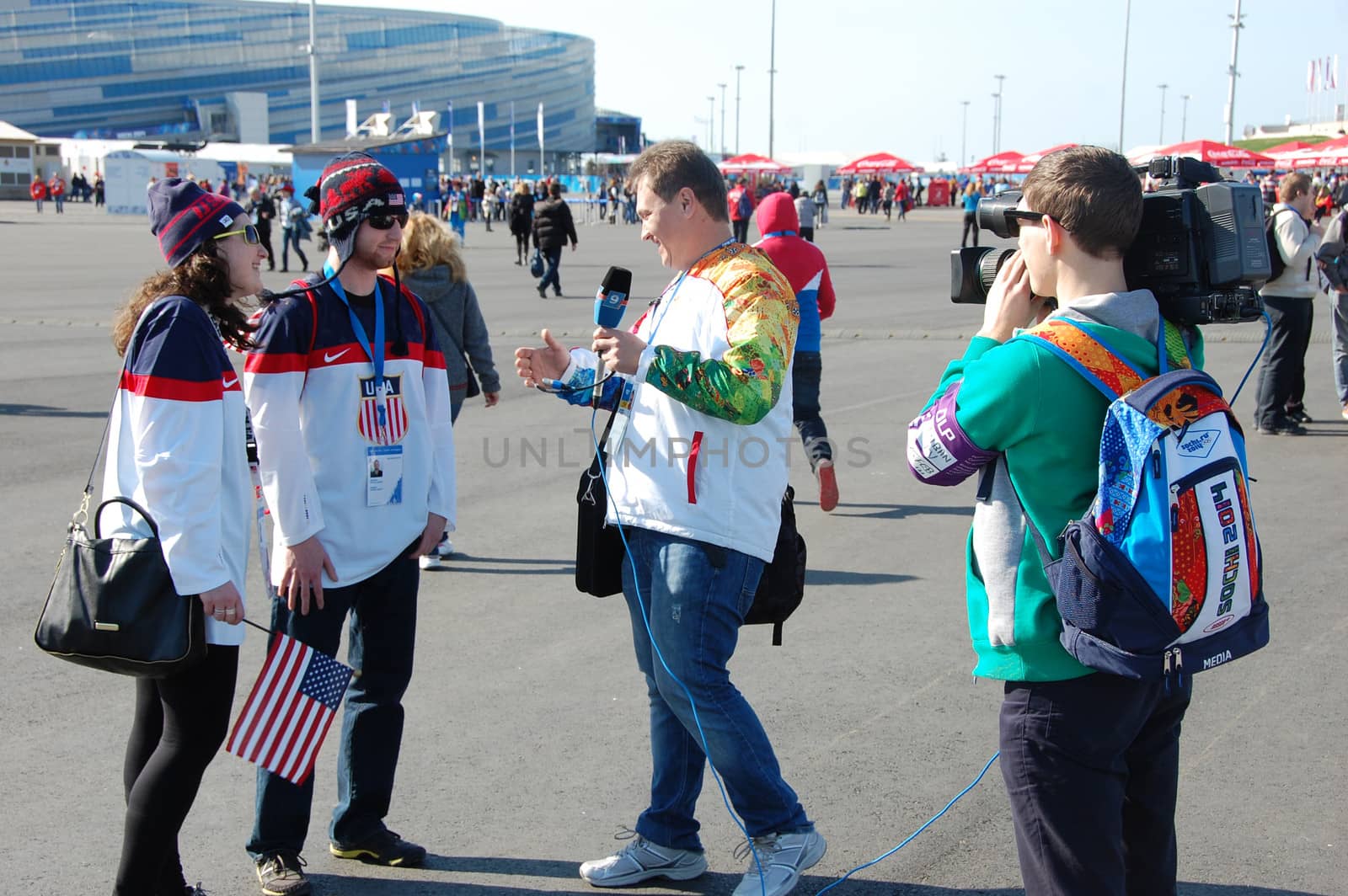 Journalist has interview with american spectators at XXII Winter Olympic Games Sochi 2014, Russia, 15.02.2014
