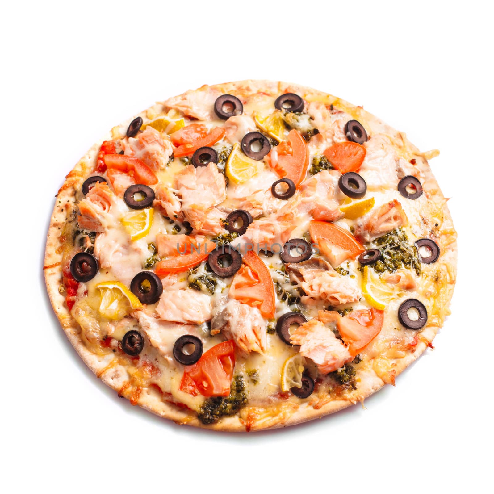 Pizza with salmon, tomatoes and olives. Isolated on white