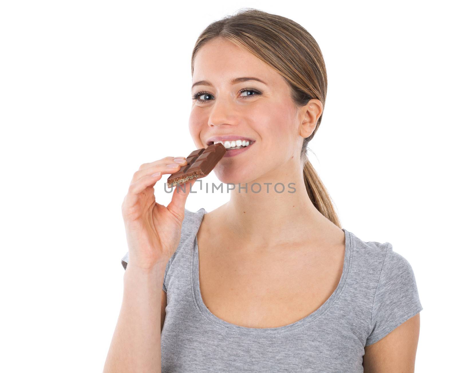 Portrait of a cute woman holding a chocolate tablet, isolated on white