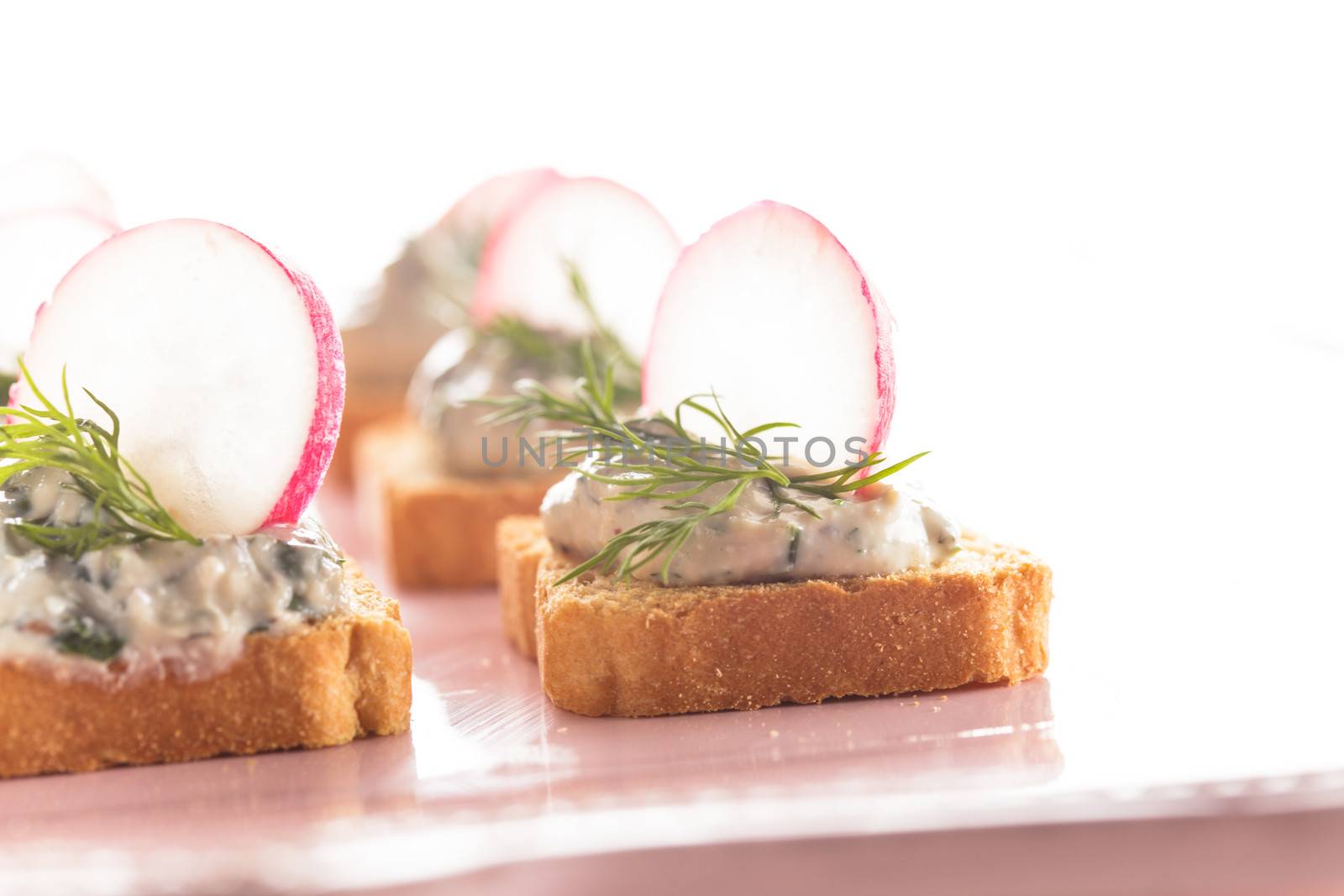 canapes with cream cheese pasta with dill and radish