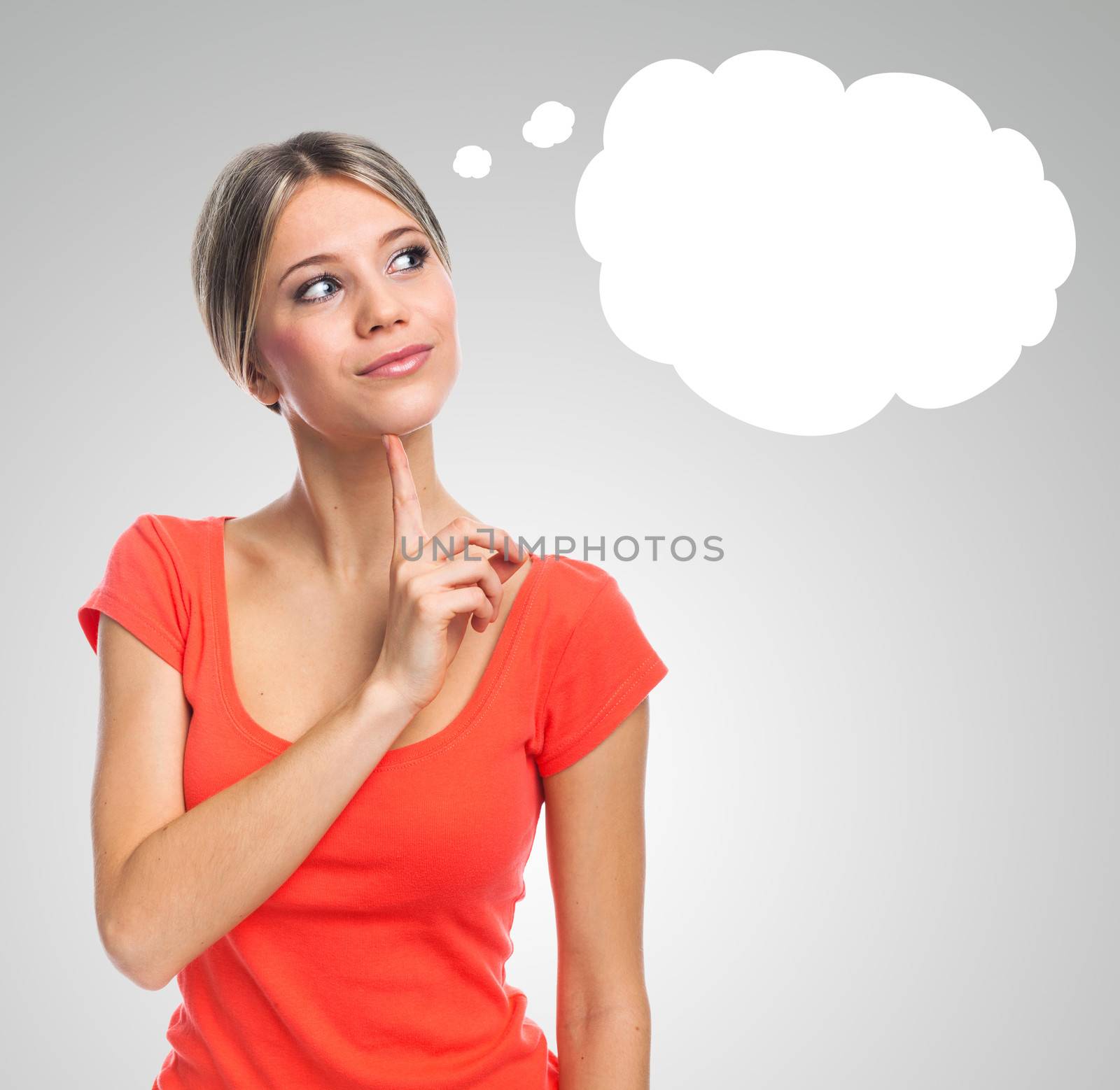 Young woman thinking, having an idea, with cartoon bubble concept