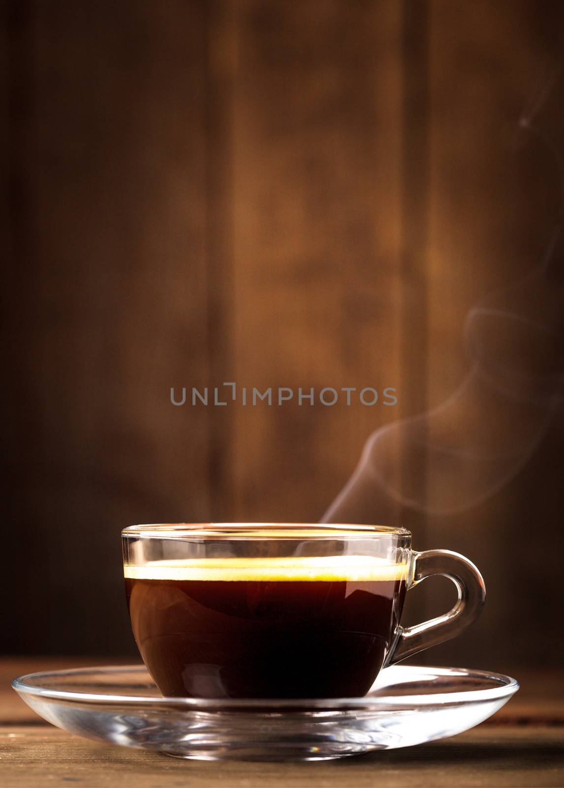 Cup of coffee in glass cup with copy space