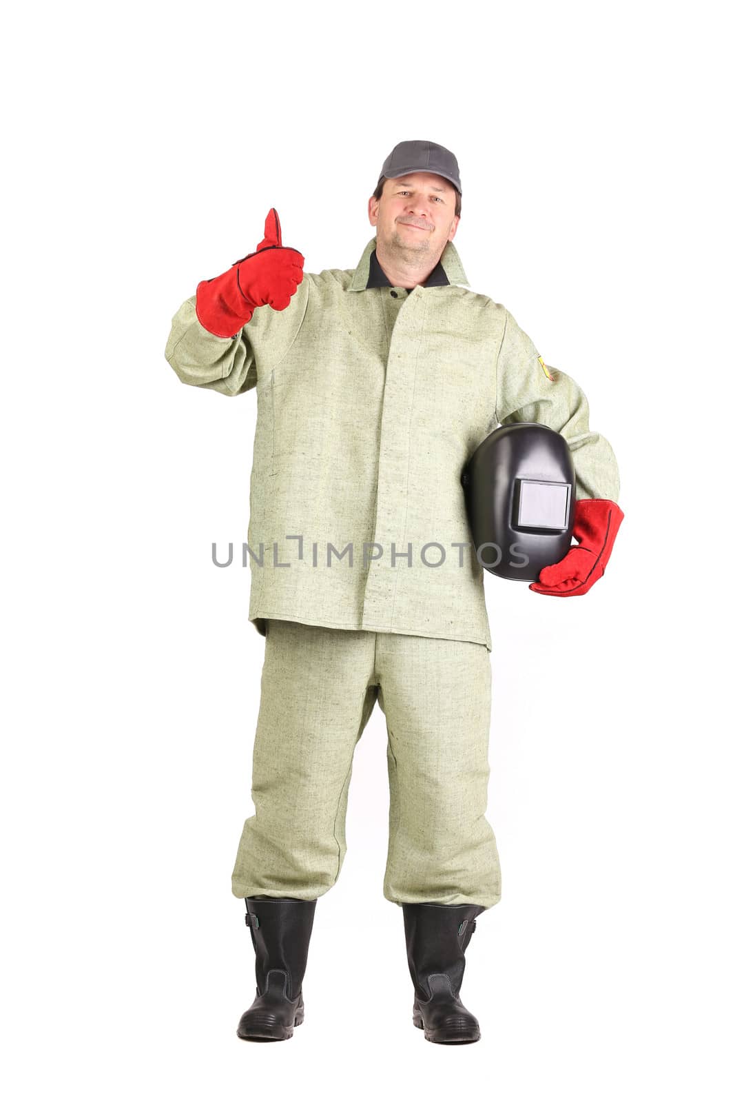 Welder shows okey sign. Isolated on a white background.