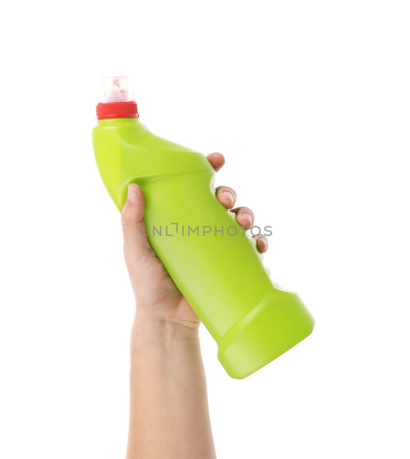 Hand holding green bottle. Isolated on a white background.