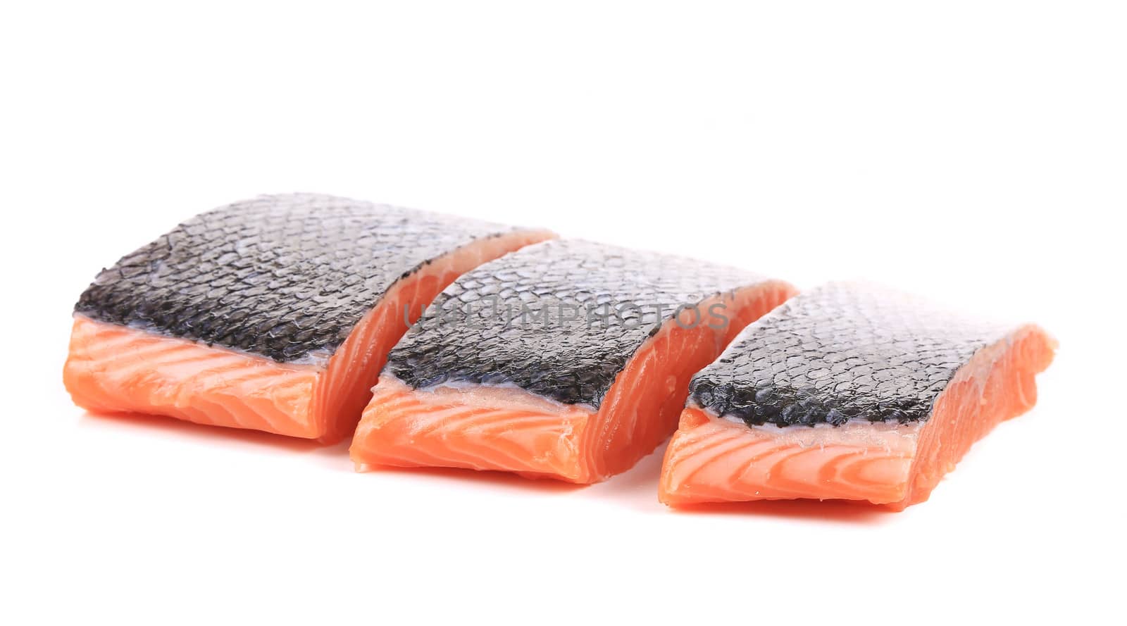 Fresh uncooked red fish fillet slices. Isolated on a white background
