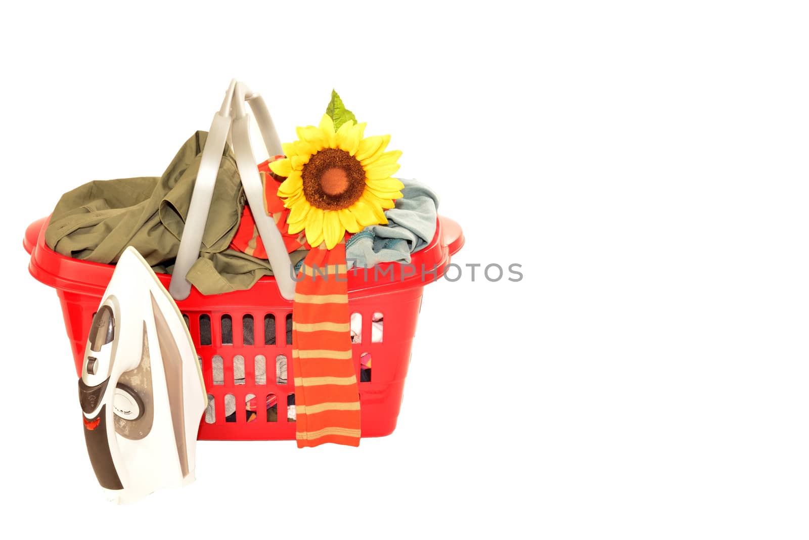 basket of wrinkled clothes and iron isolated by Carche