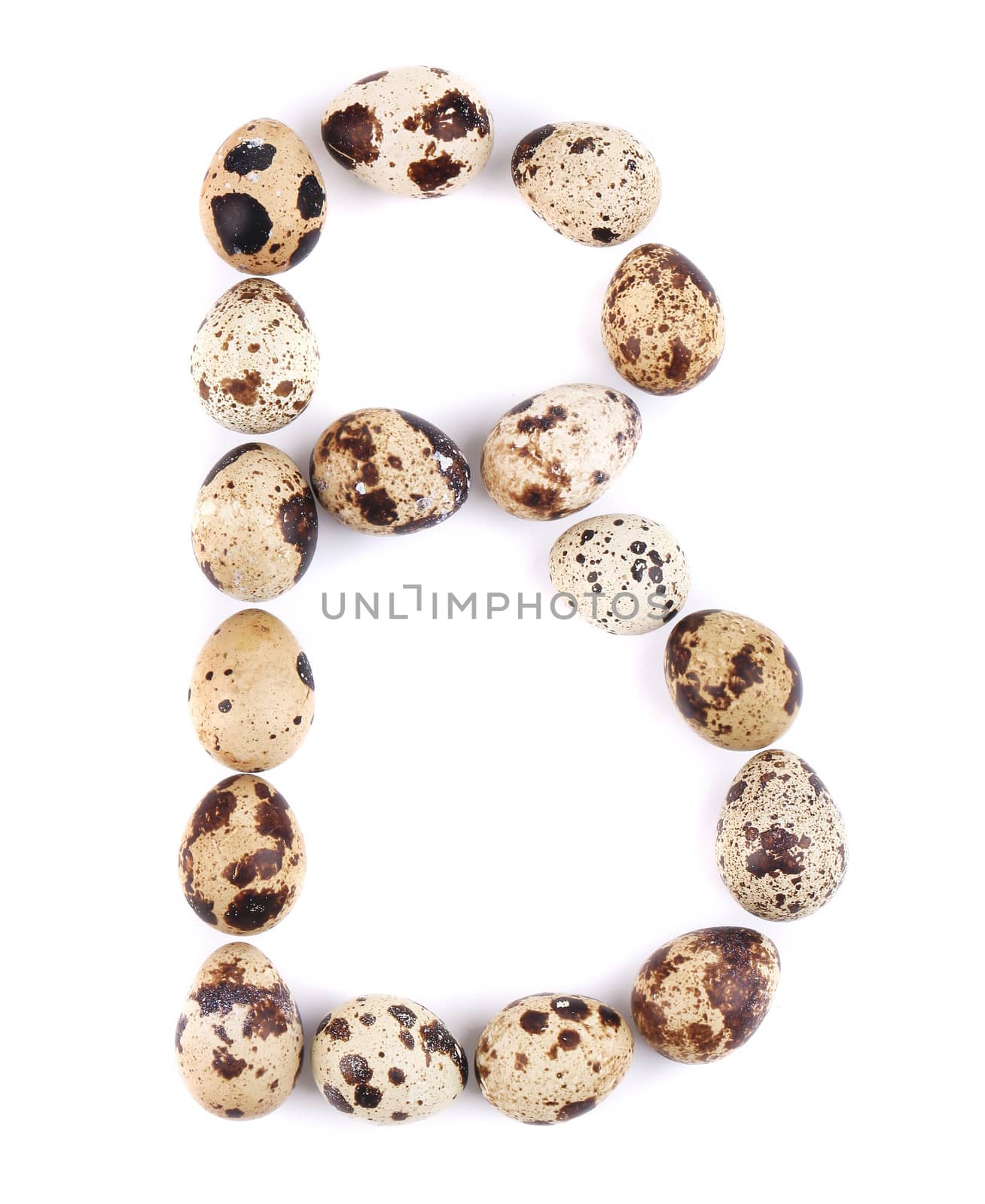quail eggs in the form of letter B. Isolated on a white background