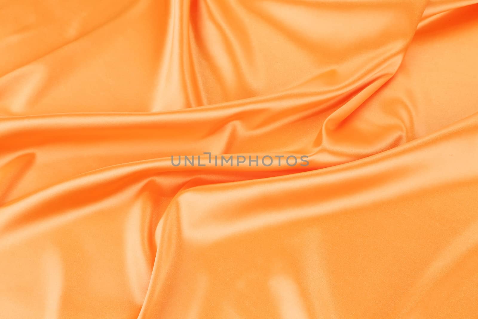 Bright orange satin. To be used as background.