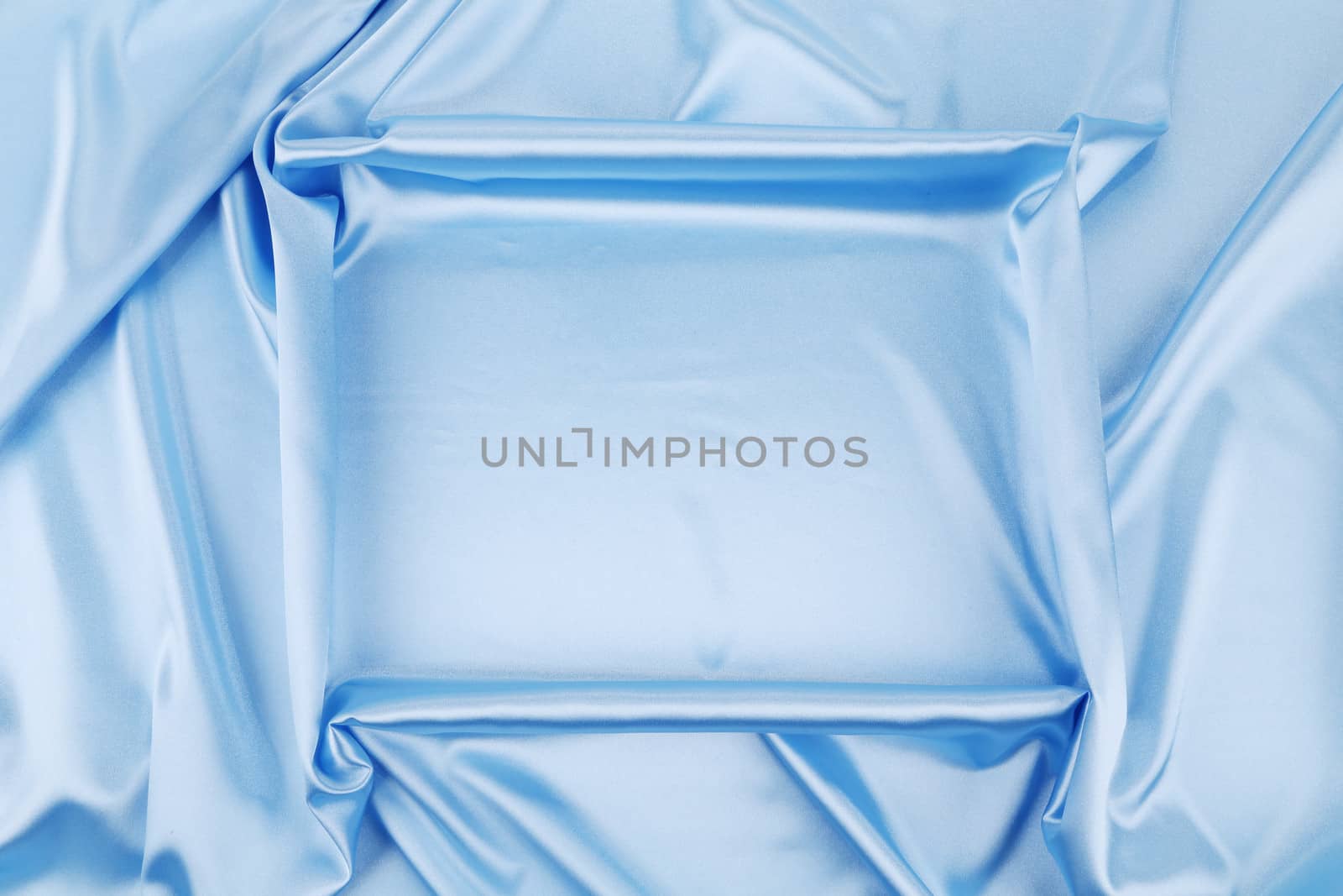 Square in blue fabric. To be used as background.